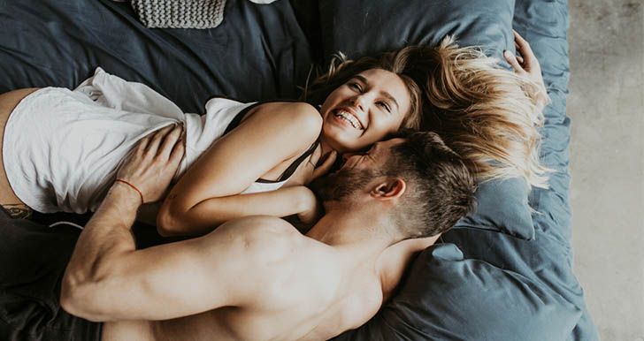 Couple Spending Whole Day In Bed Together